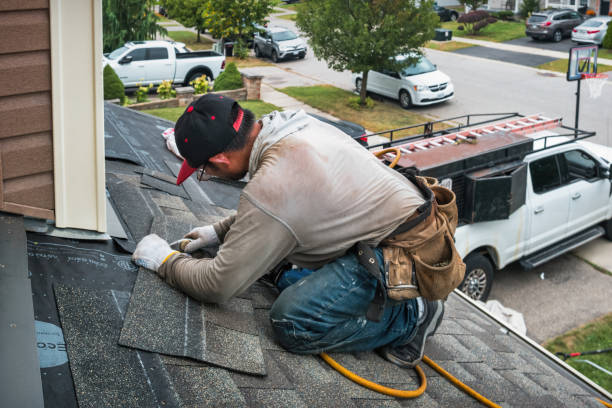 Professional Roofing technician working in Erie, ND